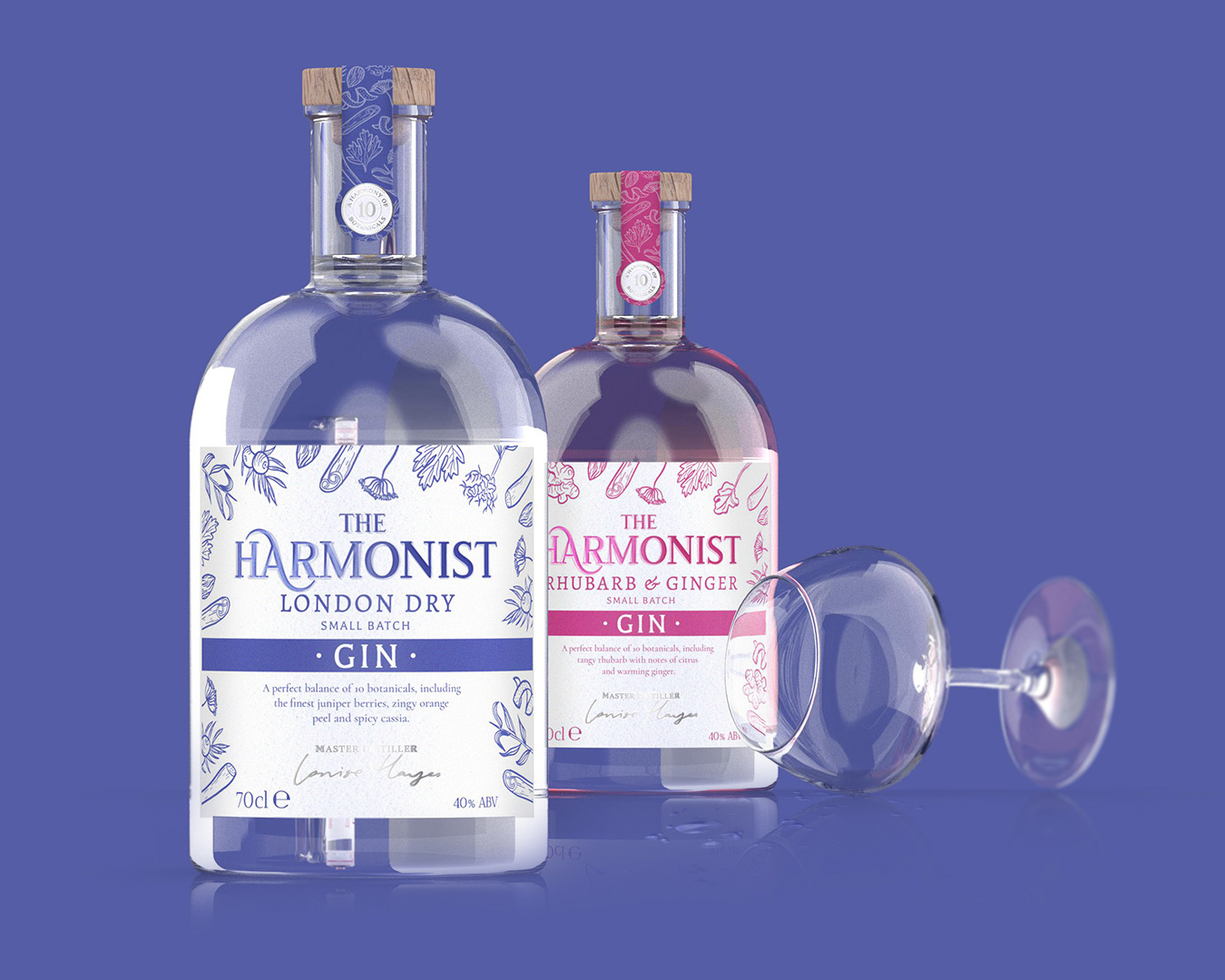 Two bottle of The Harmonist Gin against a purple background, the one in the forefront is London Dry with a white and purple label and the one standing behind is the rhubarb and ginger flavour. A glass lays on its side in front of them