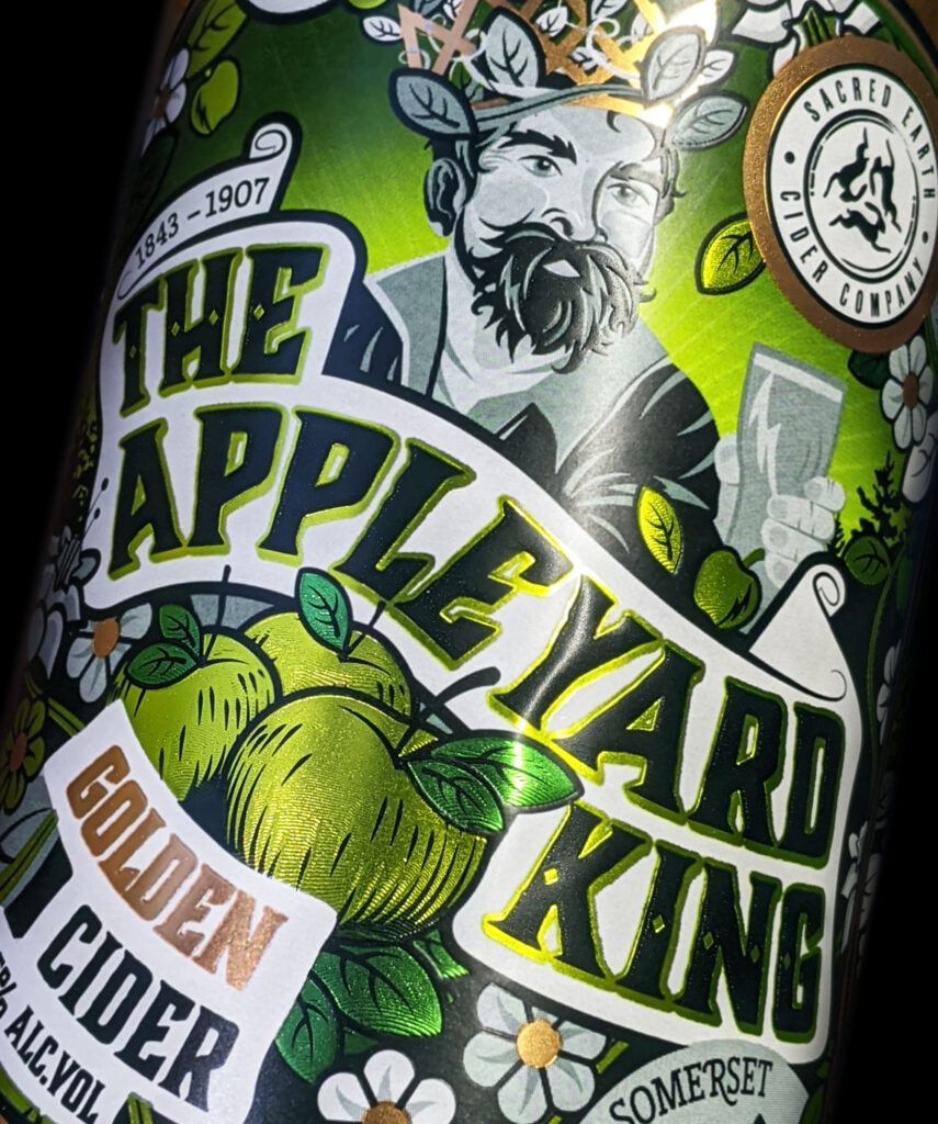 Bottle of The Appleyard King cider against a black background