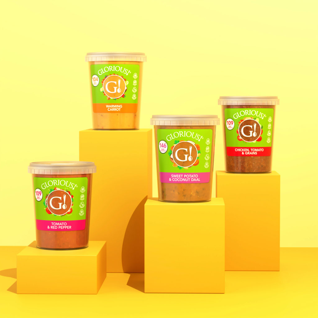 Group image of various pots of Glorious Soups in different flavours on a bright orange background
