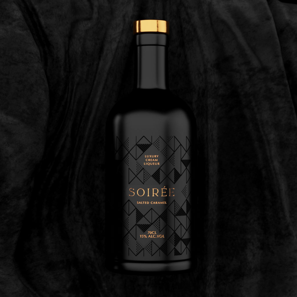 A black bottle with a geometric line pattern design with the product name 'Soiree', a luxury cream liqueur, picked out in copper foil detail, laud onto a black velvet background